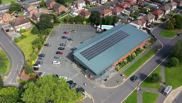 Middleton, Leeds UK 13th September 2023: Aerial footage of the town of Middleton in Leeds West Yorkshire showing the Aldi supermarket in the summer time