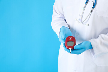 Endocrinologist with a glucometer. Diabetes treatment concept.