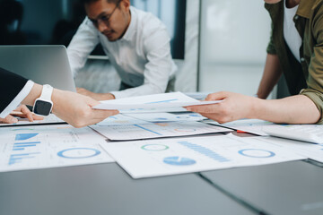 Asian business advisor meeting to analyze and discuss the situation on the financial report in the meeting room.Investment Consultant, Financial , teamwork ,brainstorming ,startup and accounting