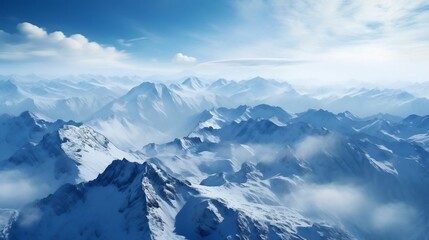 Fototapeta na wymiar Breathtaking aerial view: snow-capped mountain peaks, rugged wilderness