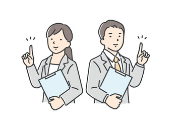 笑顔で指差しポーズをするビジネスパーソン／男女