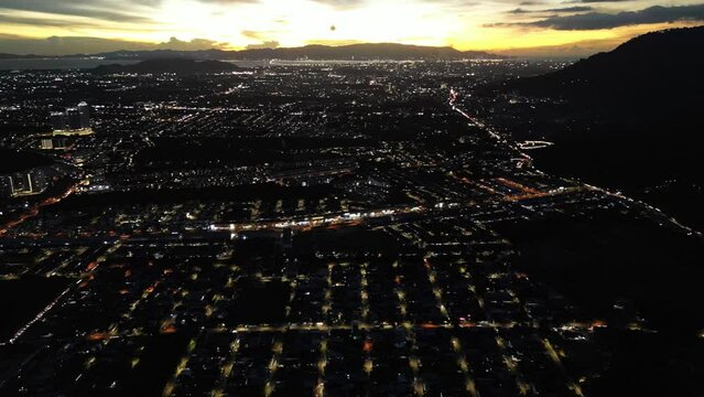 Car light trail illuminated in dusk hour at Machang Bubuk town