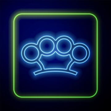 Glowing neon Brass knuckles icon isolated on blue background. Vector