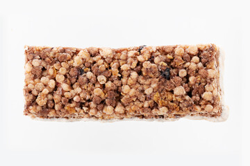 Oat and nut bar isolated on white. Granola bar. Healthy sweet dessert snack. Cereal granola bar with nuts, fruit and berries. Healthy munchies. 
