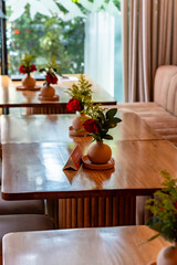 interior of a restaurant in hotel with bouquet of roses and flowers 