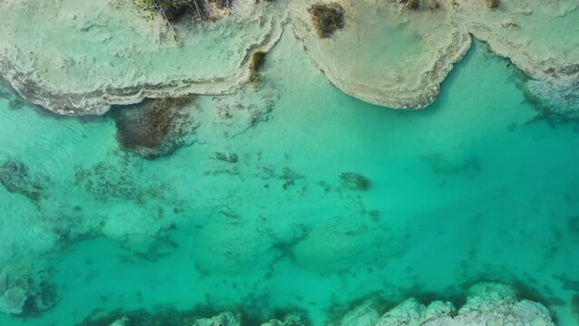 Overhead view of shallow turquoise water at Bacalar river, Yukatan, Mexico