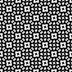 White background with black pattern. Seamless texture for fashion, textile design,  on wall paper, wrapping paper, fabrics and home decor. Simple repeat pattern.
