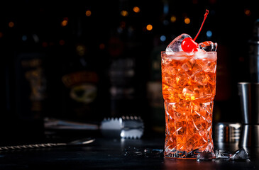 Rose with cherry, red cocktail drink with pink vermouth, amaretto liqueur, cherry juice, cocktail...