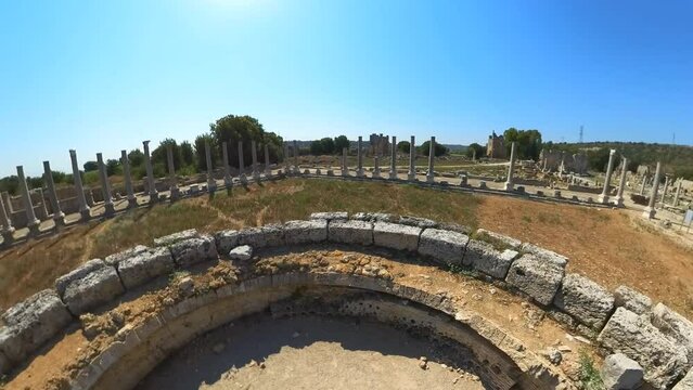 Aerial view of ancient ruins of Perge Agora in Turkey. This agora or marketplace, once served as a vibrant center for commerce, social interaction, and cultural exchange.