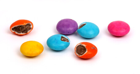 Gems Chocolates, colorful chocolate candies on white background