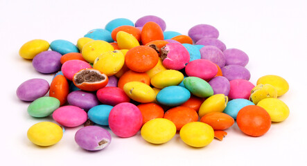 Gems Chocolates, colorful chocolate candies on white background