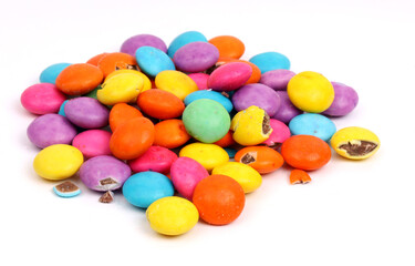 Gems Chocolates, colorful chocolate candies on white background