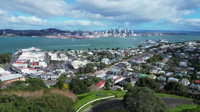 Auckland, New Zealand: Aerial drone footage of Auckland CBD skyline view from the Mount Victoria in Davenport in New Zealand largest city. 