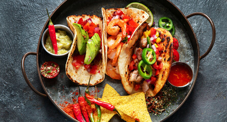 Mexican street tacos flat lay composition with lime, pepper and sauce