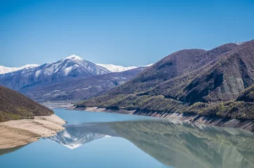 Fotobehang Zhinvali Reservoir on the Aragvi river seen from famous Georgian Military Highway, major route through the Caucasus, Georgia © Fotokon