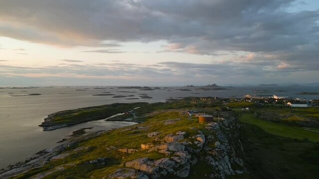 Norwegian island with a mountain peak and a fishing village, Trana island