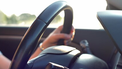 Car Dashboard and Female Hands Holding Steering Wheel During Driving Slow Motion