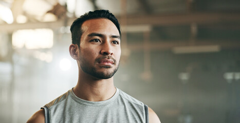 Thinking, serious and a man at the gym for fitness, exercise idea or health. Motivation, sports and...