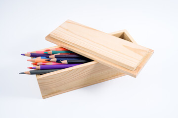 Hand Made bespoke pen pencil case made out of scrap wood with loose fit lid isolated on a white background