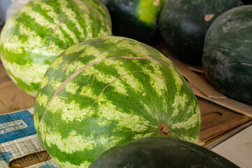 Watermelons with milky green colors are put out for sale