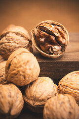 Walnut and nutcracker on vintage background