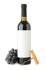 Red wine bottle with grape and corkscrew isolated on white background