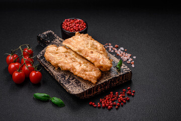 Delicious fried chicken chop or pork meat fried breaded with salt, spices and herbs