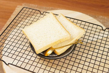 Slice bread on wooden table