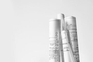 architect design working drawing sketch plans blueprints and making architectural construction model in architect studio,flat lay.