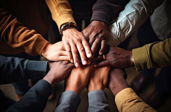 Partners put their hands together, business unity and cooperation concept