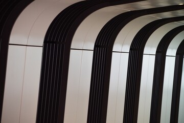 the ceiling has several vertical lines of black and white stripes