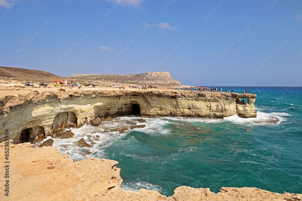 Wall mural Turquoise lagoon with sea waves splashing over the shore, Cape Greco Peninsula Park, Cyprus