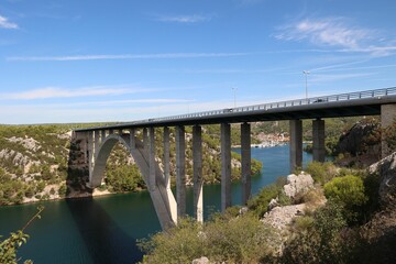 View of a road bridge over the Krka River. Skradin, Croatia.