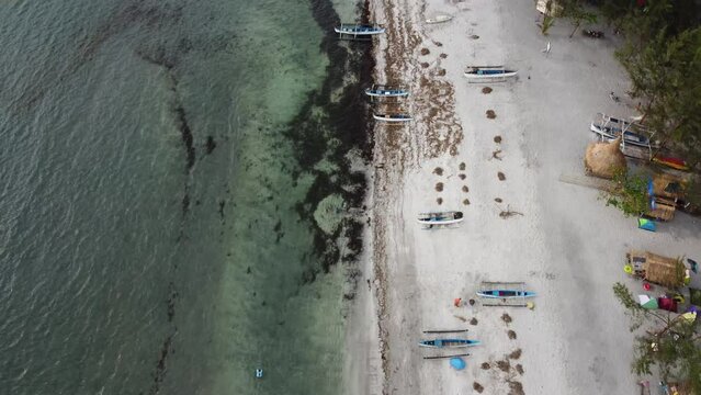 Aerial video of the boats on the sea shore, Nagsasa Cove, Zambales, Philippines