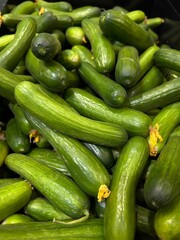 Overflow of freshly picked zucchini in a vibrant green hue.