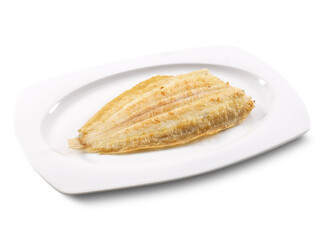 Lenguado a la plancha sobre plato en fondo blanco, vista cenital. Grilled sole on plate on white background, overhead view.