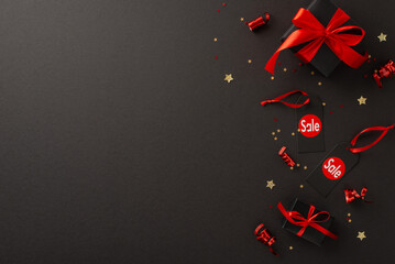 Black Friday shopping spree with amazing deals. Overhead photo of black gift box, 