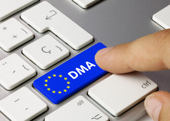 DMA Digital Markets Act - Inscription on Blue Keyboard Key.