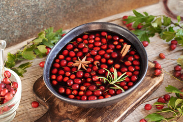 Preparation of medicinal drink from hawthorn berries and red wine