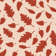 Vector seamless pattern with brown leaves on beige. Autumn nature pattern. Vector illustration