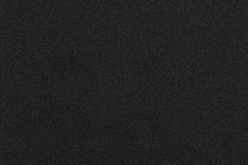 Fototapeta na wymiar Pattern of black matte nylon background
