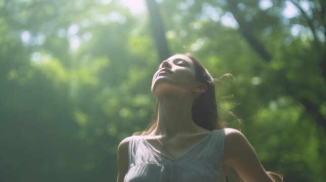 A serene image depicting the concept of outdoor breathing, featuring a person deeply inhaling fresh air amidst a lush, green forest, symbolizing tranquility, mindfulness, and connection with nature.