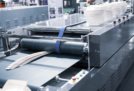 Production of automatic box folder gluer machine for box or carton packaging. Printing industry	