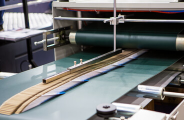 Production of automatic box folder gluer machine for box or carton packaging. Printing industry	