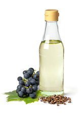 Glas bottle with grape seed oil isolated on white background close up