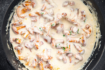mushroom chanterelle julienne cream sauce meal food snack on the table copy space food background rustic top view 