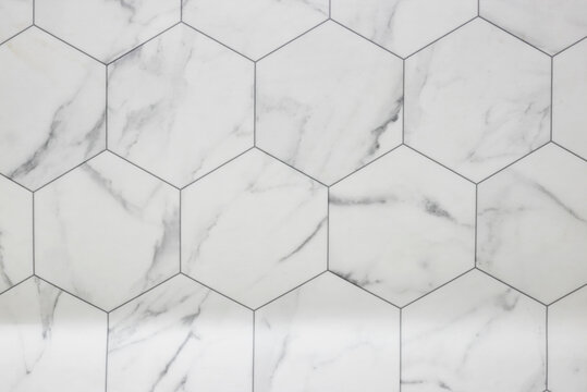 white marble wall with hexagon tiles for texture and background