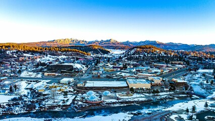 Aerial view of the Pagosa Springs Colorado Mountains and nearby areas at sunrise