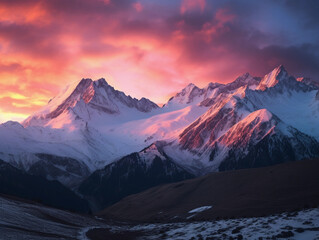 Obraz premium mountain sunset, sun setting below snowy peaks, magenta and teal sky, dramatic shadows