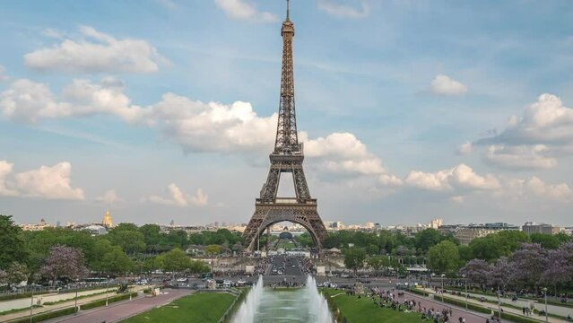 Paris France time lapse 4K, city skyline timelapse at Eiffel Tower and Trocadero Gardens